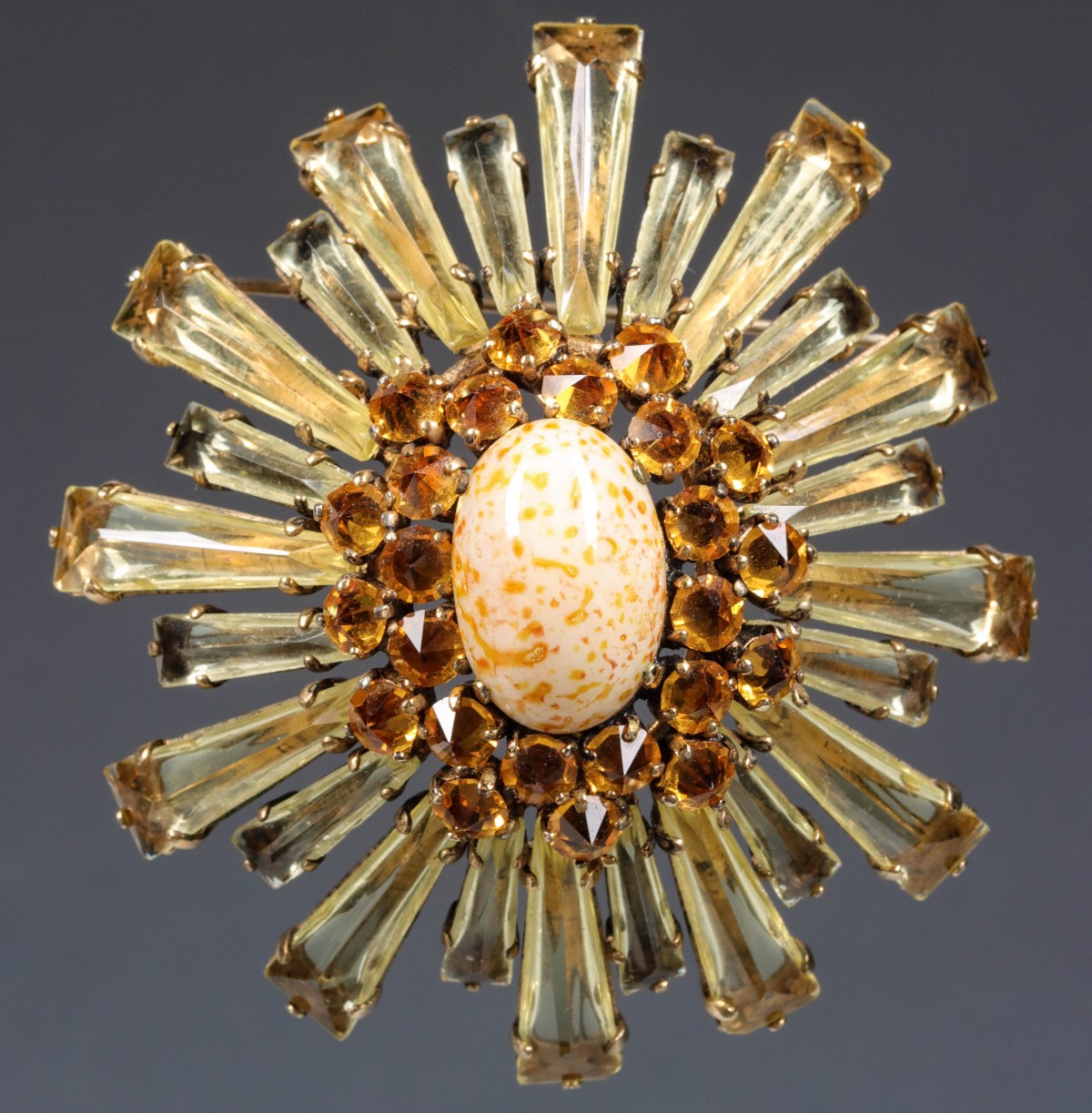 A LARGE COSTUME JEWELRY BROOCH VERIFIED AS SCHREINER