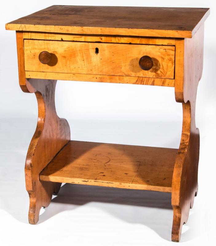 A 19TH C. TIGER MAPLE TRESTLE BASE STAND TABLE
