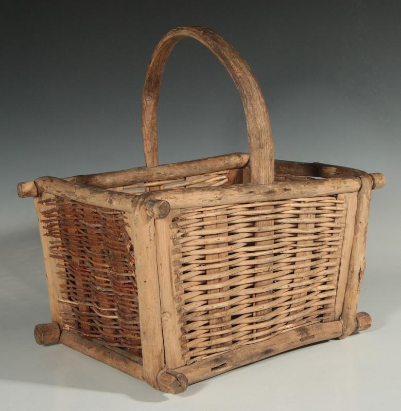 AN UNUSUAL ANTIQUE BENT AND CARVED WOOD BASKET