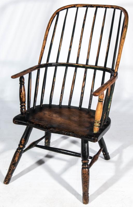 AN 18TH CENTURY WINDSOR CHAIR IN OLD BLACK PAINT