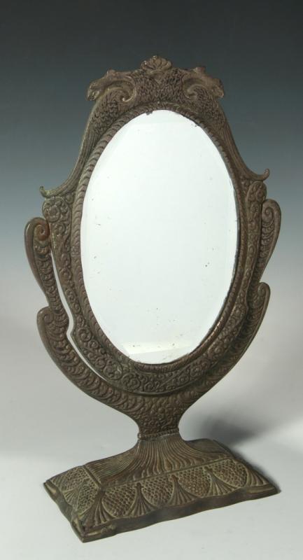 A C.1900 BRASS TABLE-TOP CHEVAL MIRROR W/ GRIFFINS