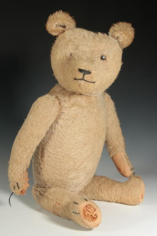 A 16-INCH ANTIQUE EXCELSIOR-FILLED TEDDY BEAR 