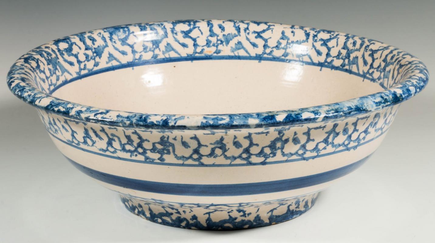 A LARGE BLUE AND WHITE SPONGE WARE WASH BASIN