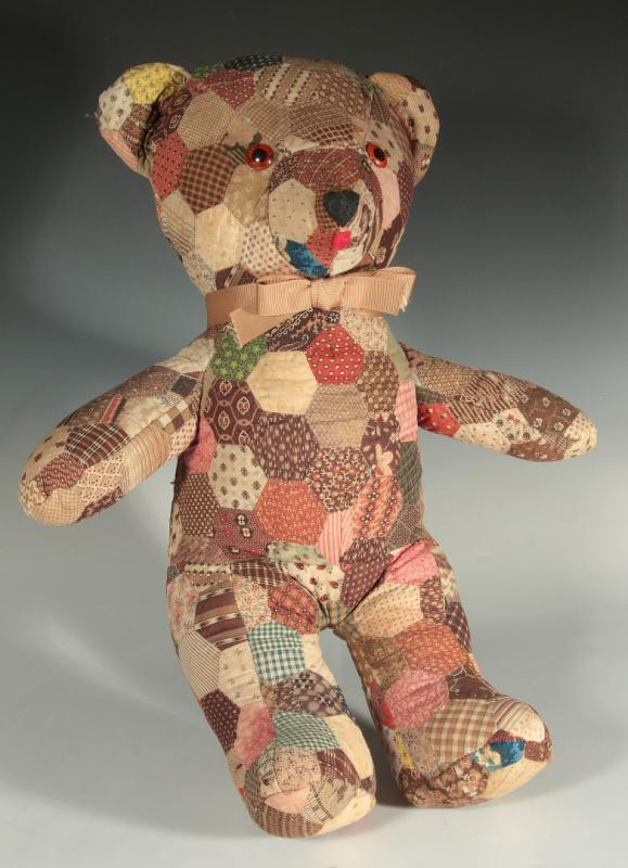 A VINTAGE HAND STITCHED QUILT BLOCK TEDDY BEAR 
