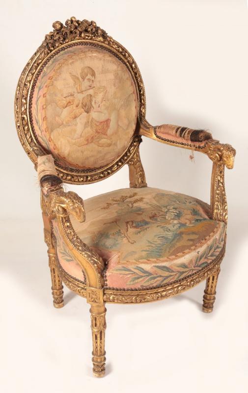 A 19THC. FRENCH RAM'S HEAD ARM CHAIR WITH TAPESTRY