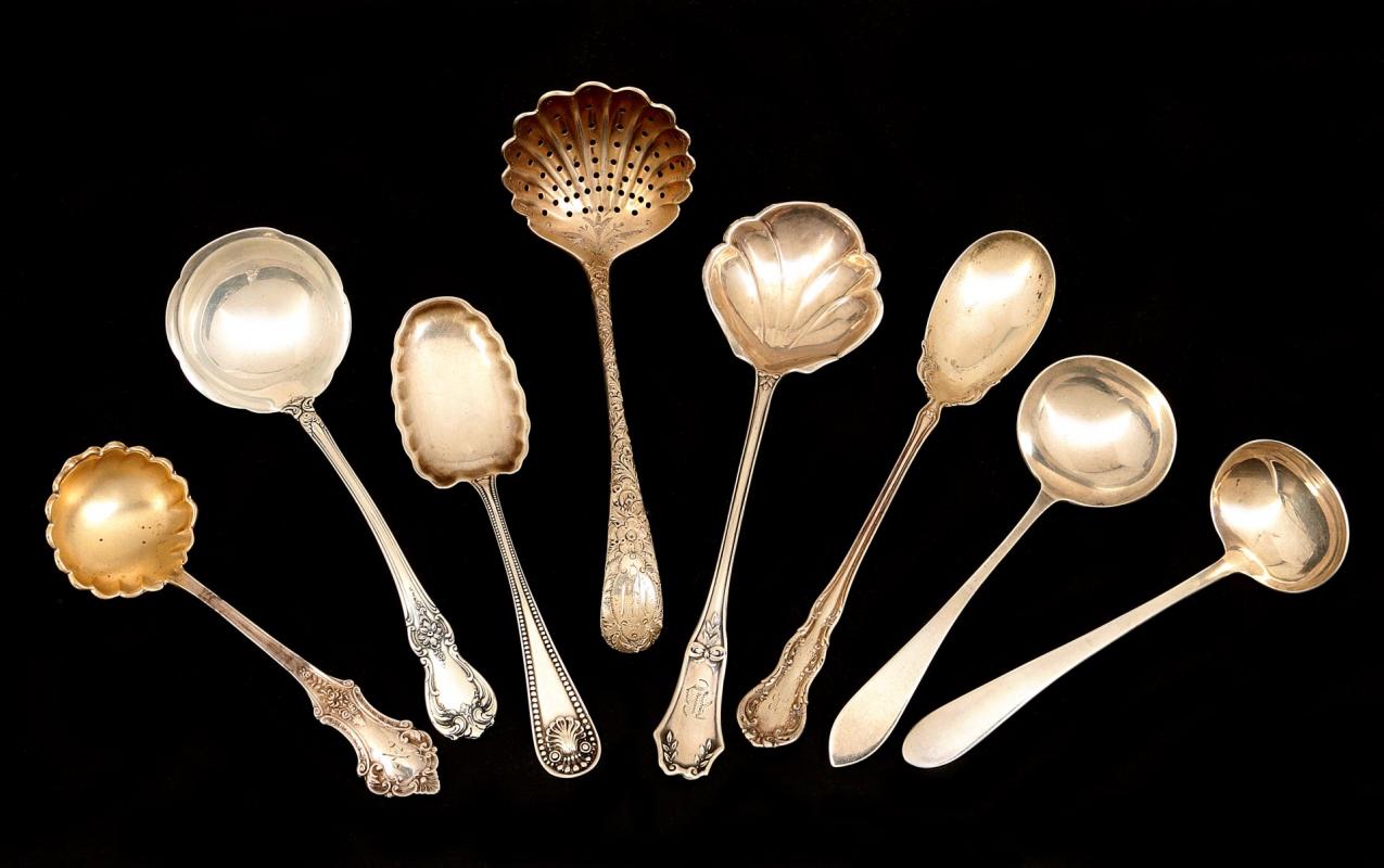 AN ESTATE LOT OF STERLING SILVER SPOONS AND LADLES