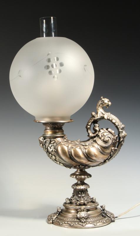 A CIRCA 1900 SILVERED GRIFFIN HARVARD LAMP