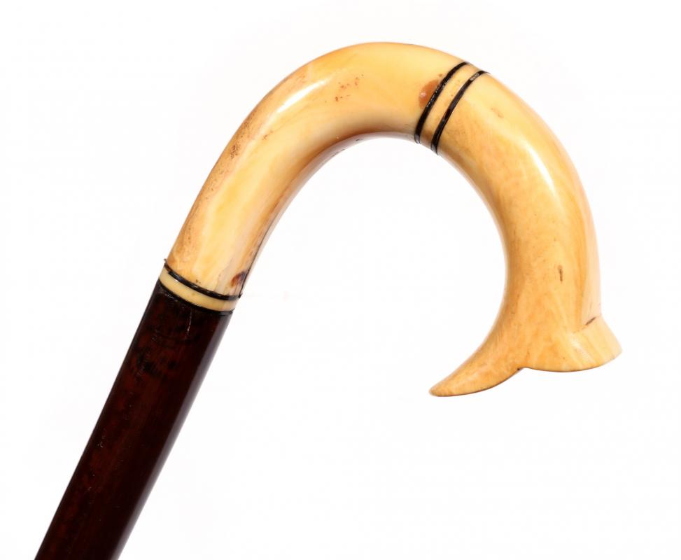 A 19TH CENTURY MARINE IVORY AND SNAKE WOOD CANE