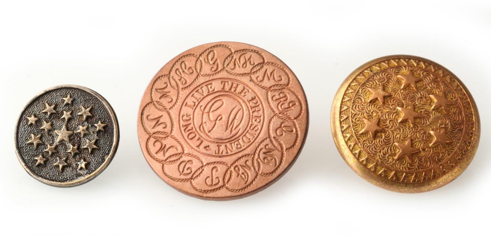 THREE ANTIQUE BUTTONS