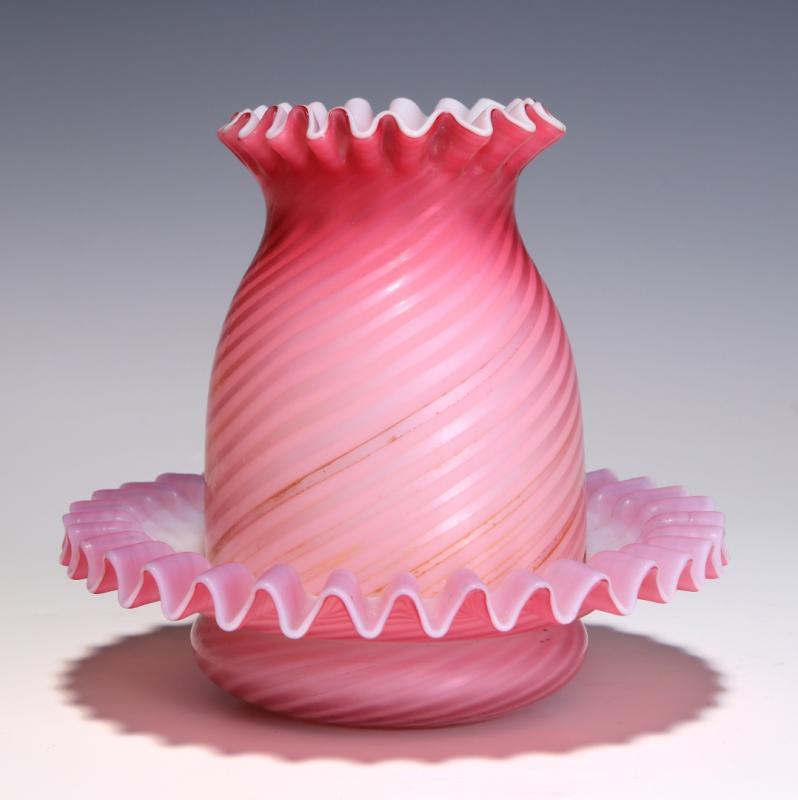 A 19TH C. RED INTERNAL AIR TRAP SWIRL FAIRY LAMP