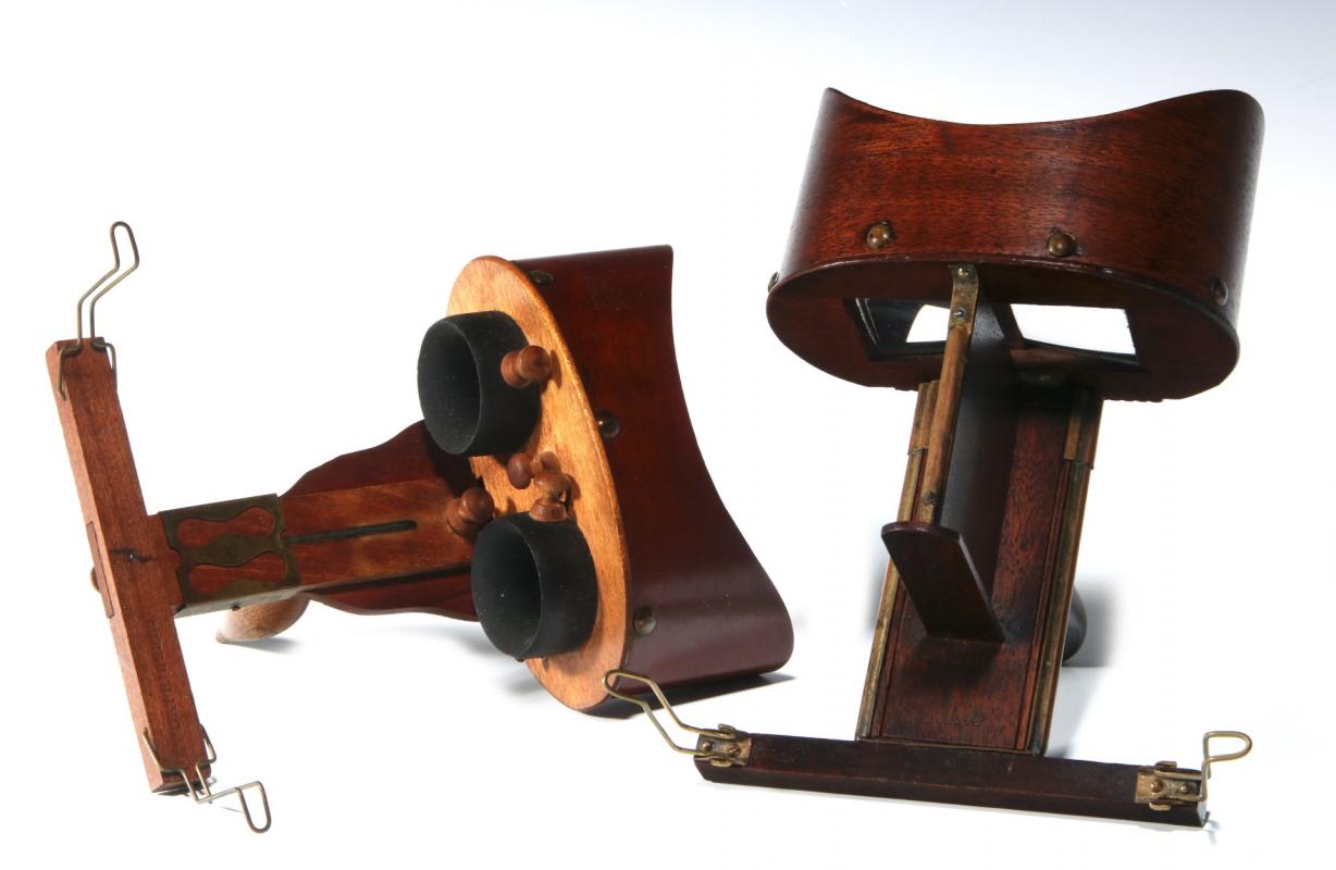 TWO UNUSUAL 19TH CENTURY HAND-HELD STEREOSCOPES