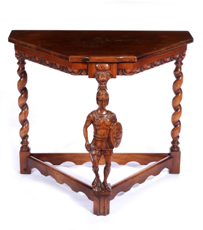 AN EARLY 20C. CONTINENTAL CARVED WALNUT STAND