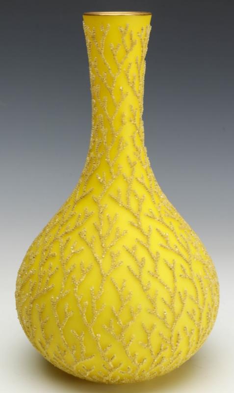 AN INTENSE YELLOW SATIN GLASS VASE WITH CORALENE