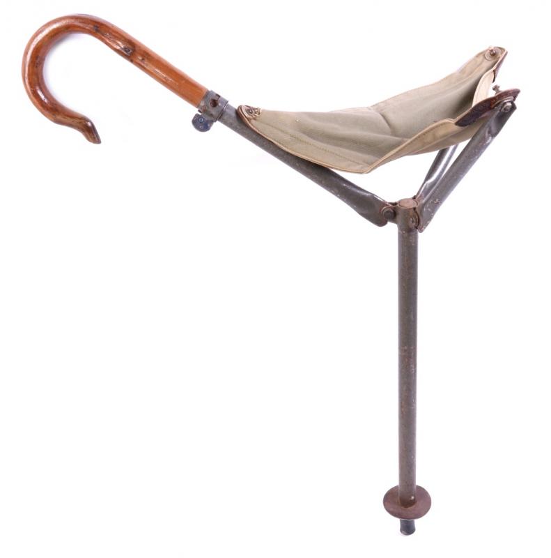 AN EARLY 20TH C. FOLDING HAMMOCK SEAT CANE