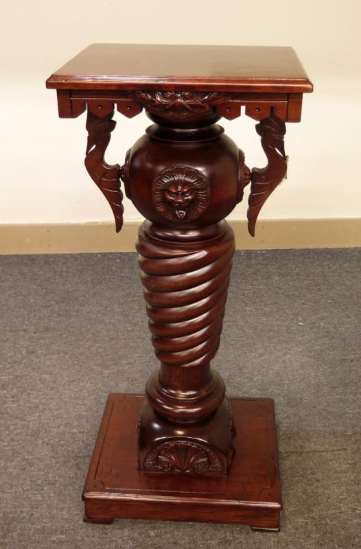 A CARVED CHERRY ROPE-TWIST FORM PEDESTAL WITH LION