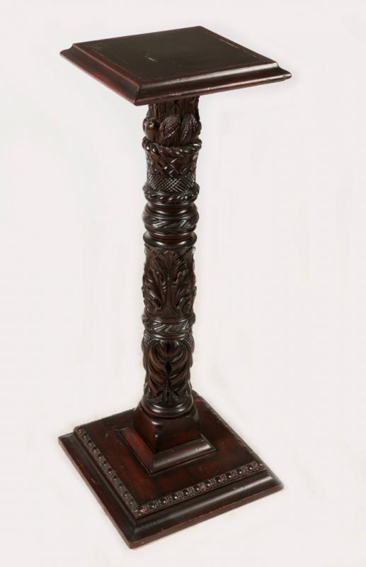 AN ACANTHUS CARVED PEDESTAL