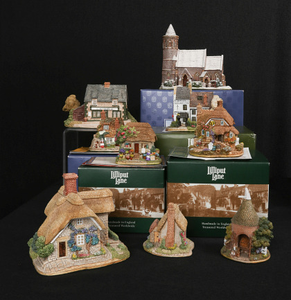 A Large Collection of Lilliput Lane Cottages Offered as One Lot