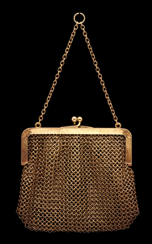 A MINIATURE SOLID 14K GOLD NETTED MESH PURSE