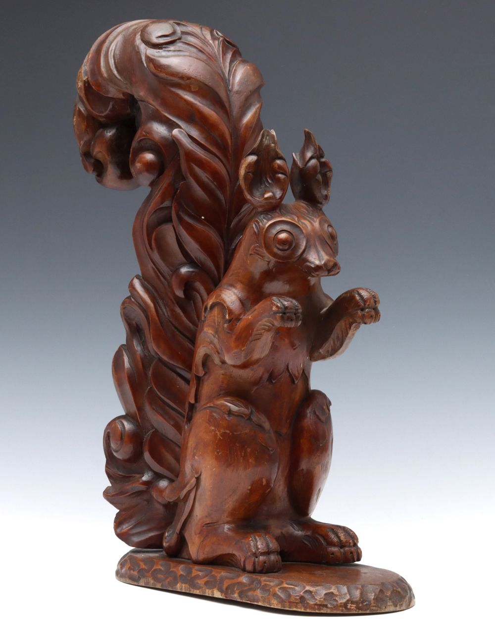 AN EARLY 20TH C. CARVED WALNUT SCULPTURE SIGNED MACABO