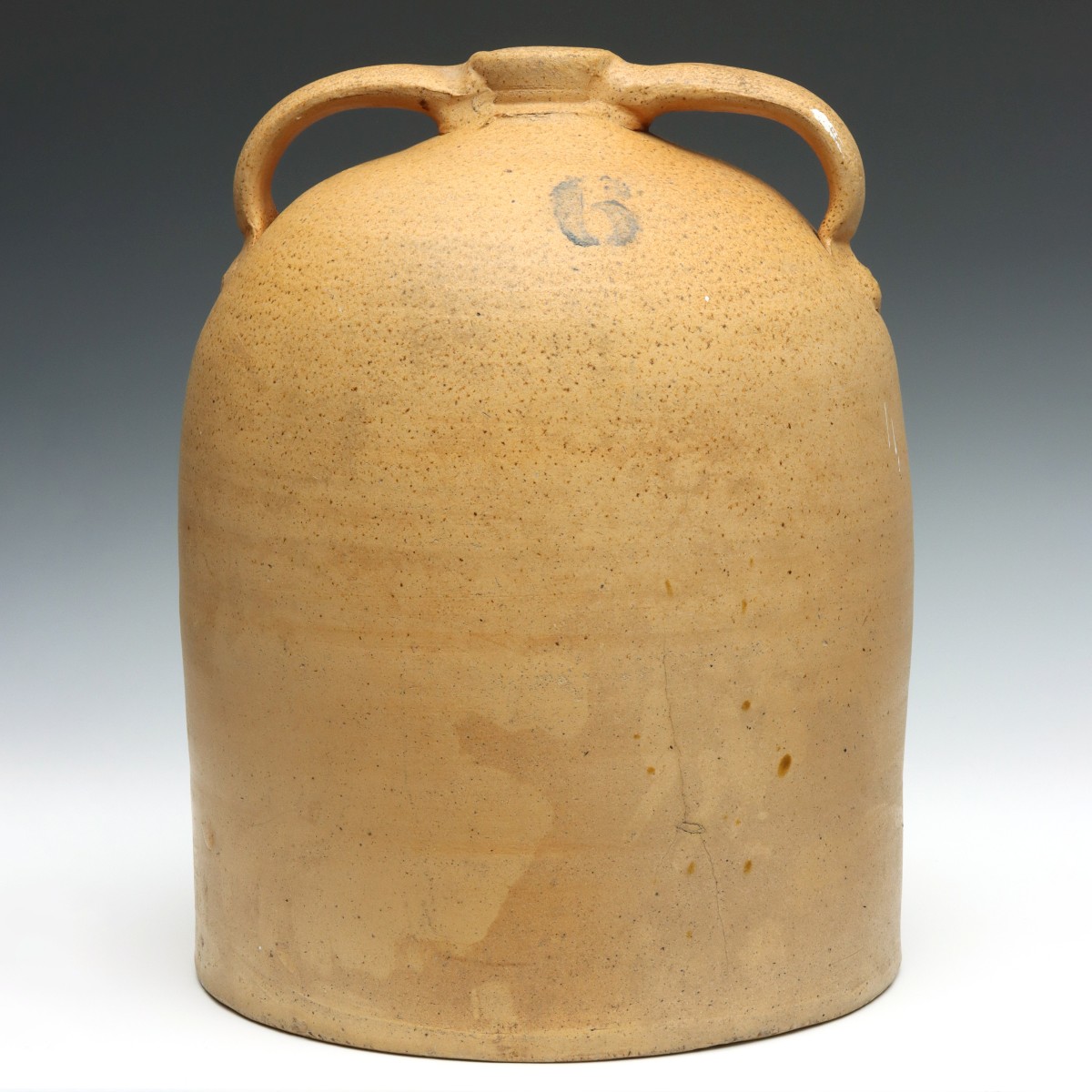 A LARGE BEEHIVE FORM STONEWARE JUG WITH TWO HANDLES
