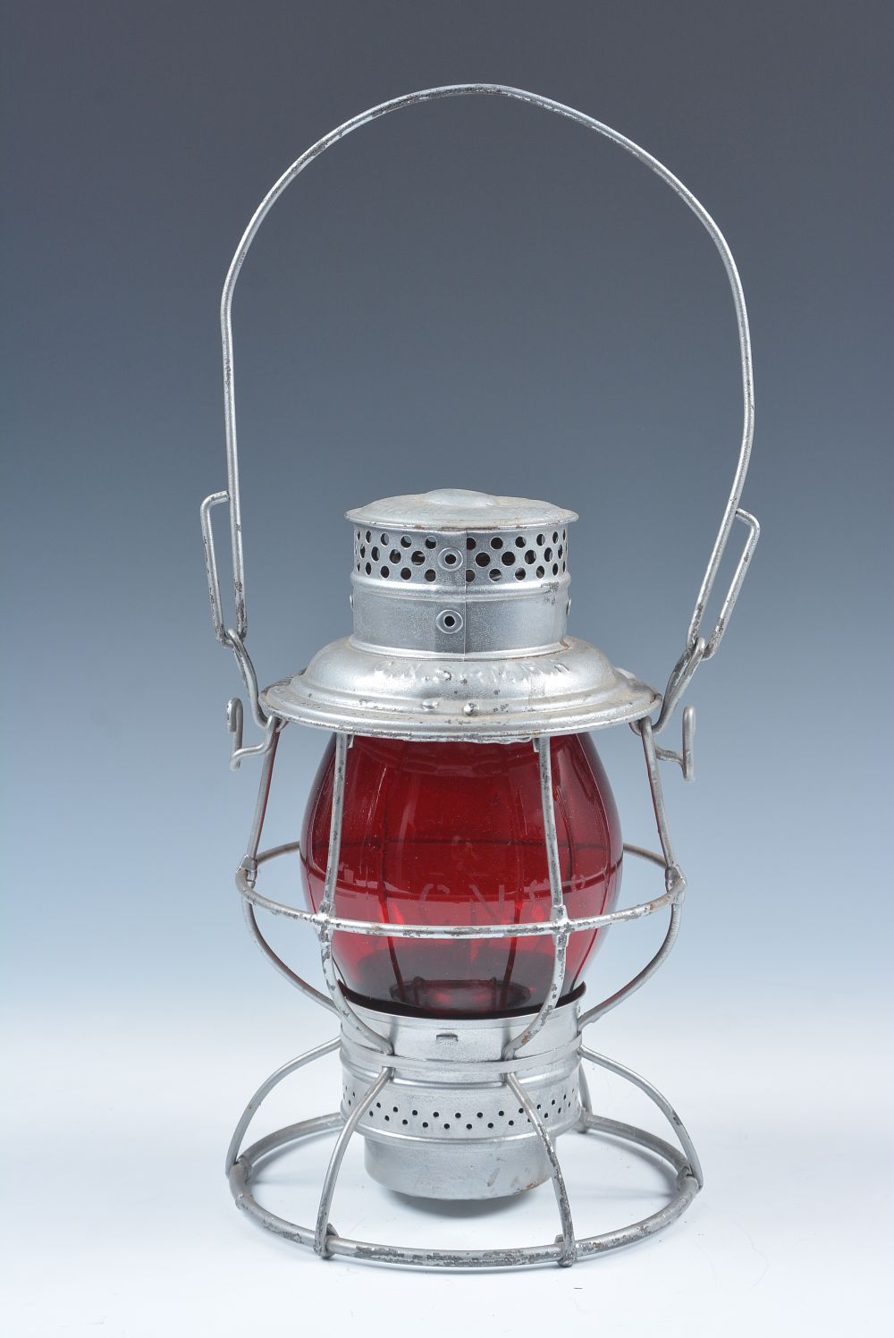 A LANTERN WITH RED TALL GLOBE ETCHED C.N.S.&M.R.R.