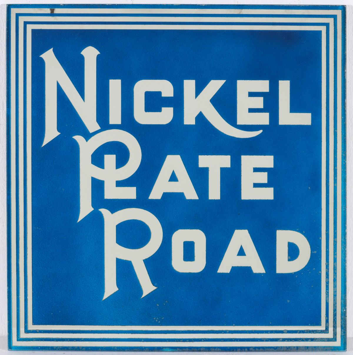 A NICKEL PLATE ROAD REVERSE PAINTED AND ETCHED GLASS