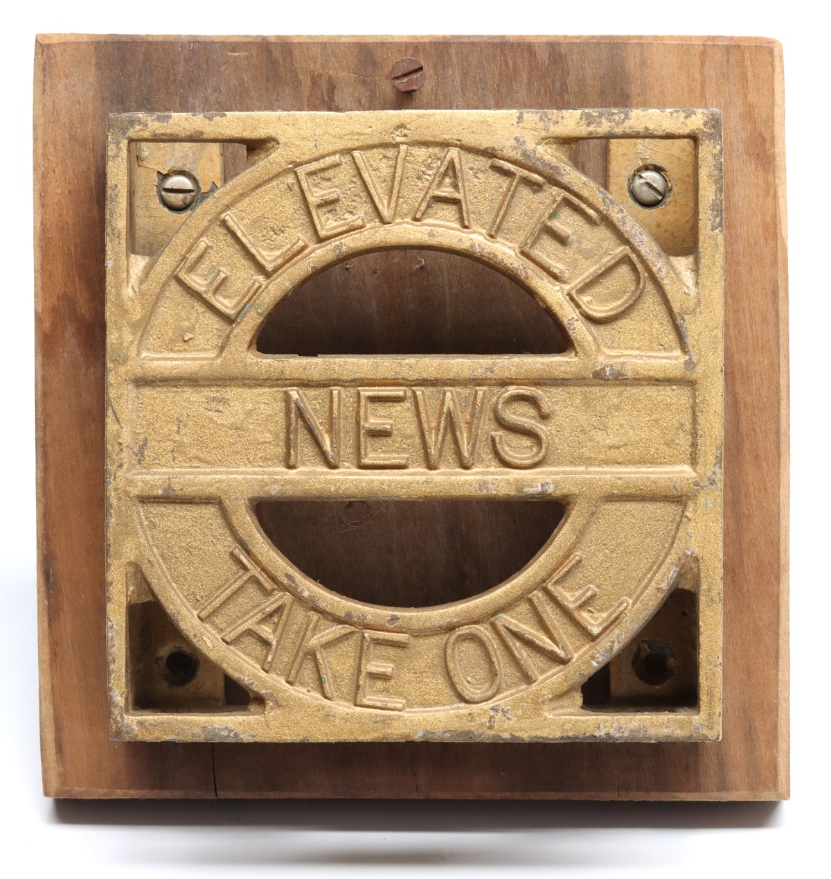 A BRASS BROCHURE HOLDER FOR ELEVATED NEWS ''TAKE ONE''