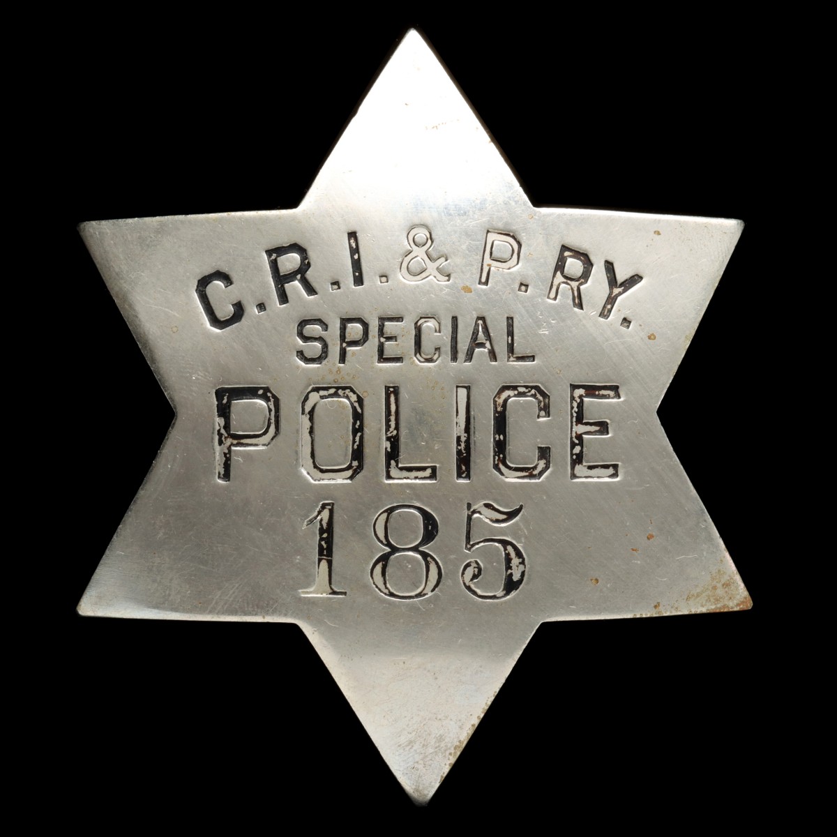 A SIX-POINT ROCK ISLAND RAILROAD SPECIAL POLICE BADGE