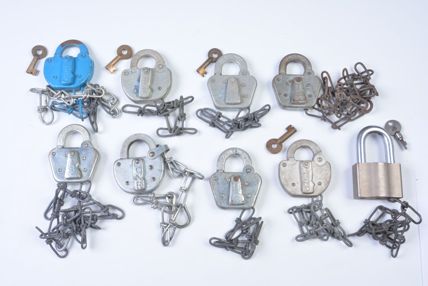 A COLLECTION OF PADLOCKS WITH RAILROAD MARKINGS