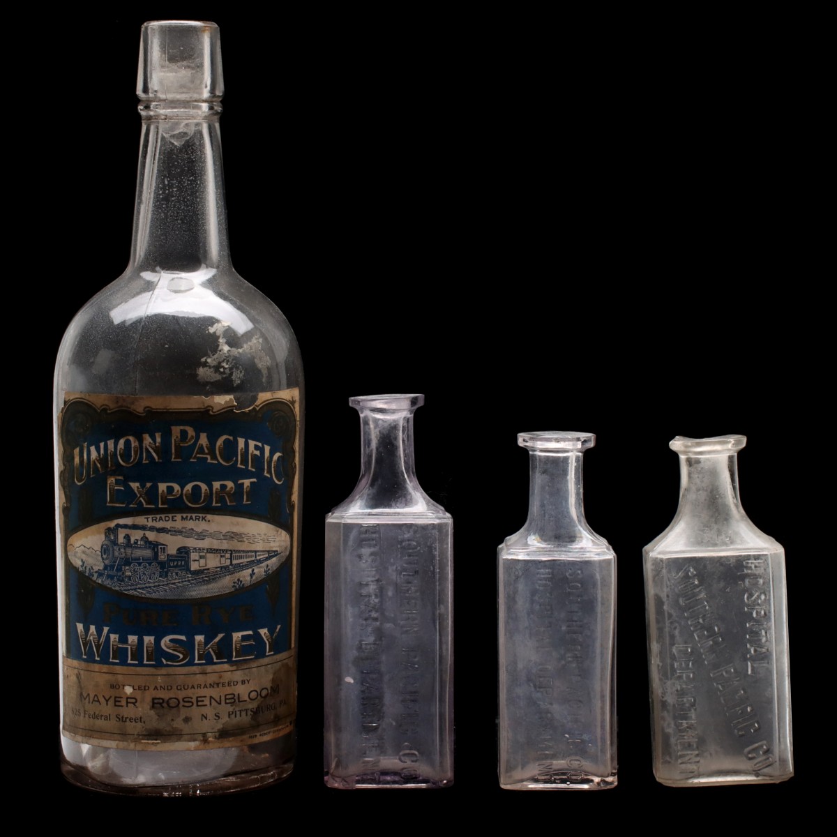 UNION PACIFIC WHISKEY BOTTLE WITH LABEL, SP RR MEDICINE
