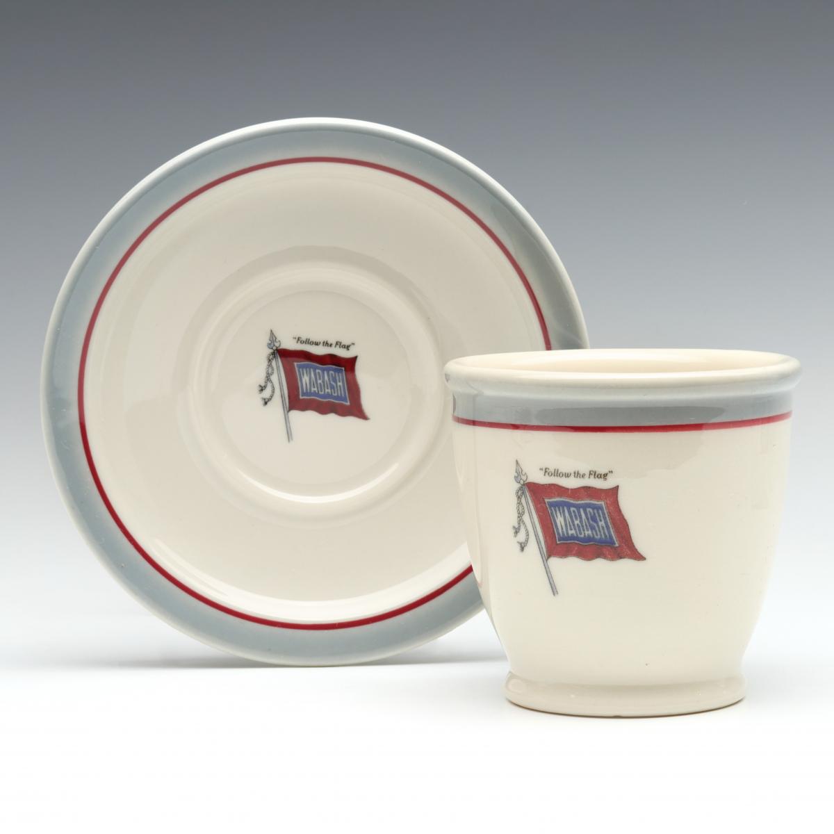 A RARE WABASH DOUBLE EGG CUP WITH UNDERPLATE