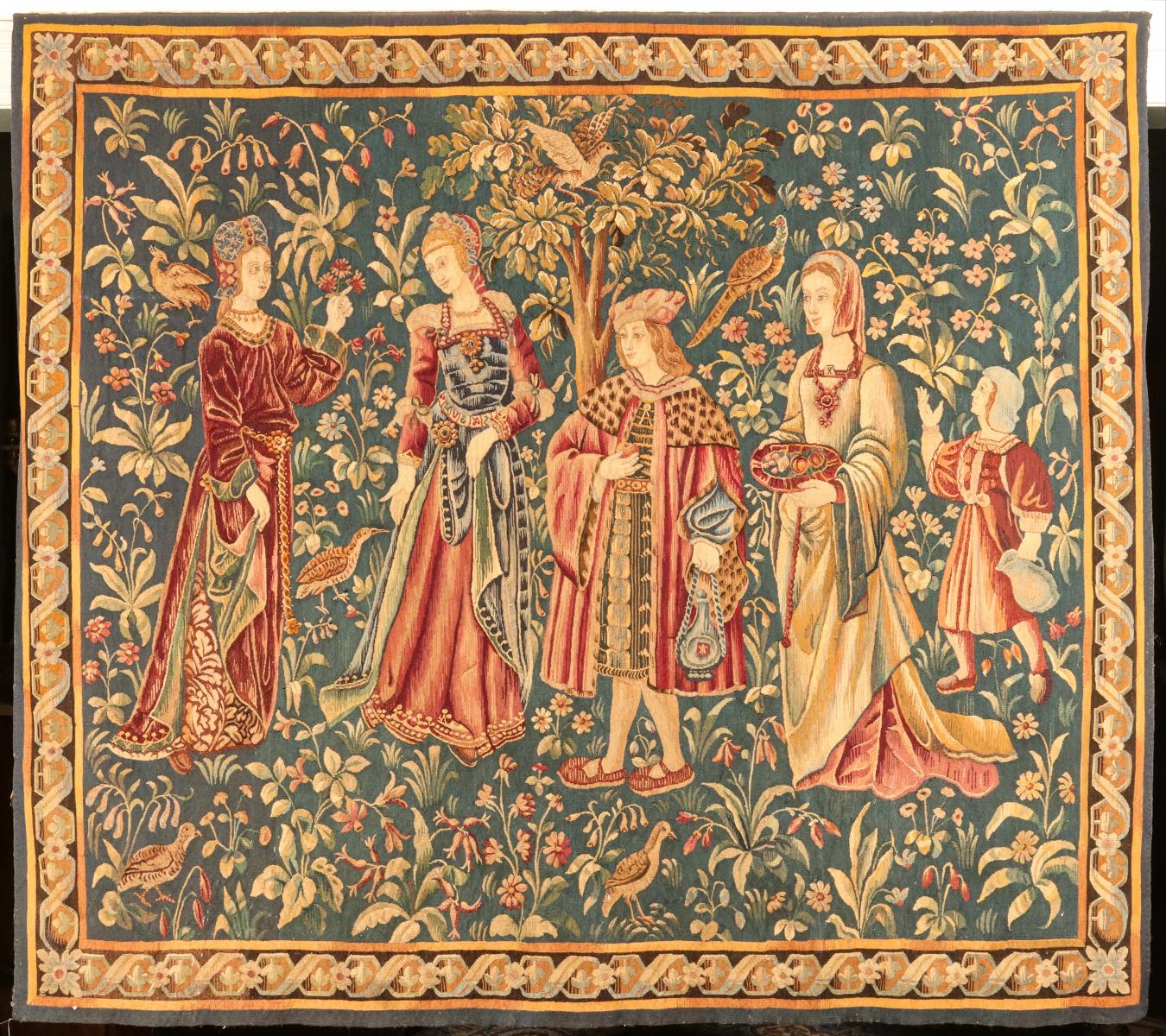 AN ANTIQUE FRENCH MILLE FLEURS WOOL TAPESTRY