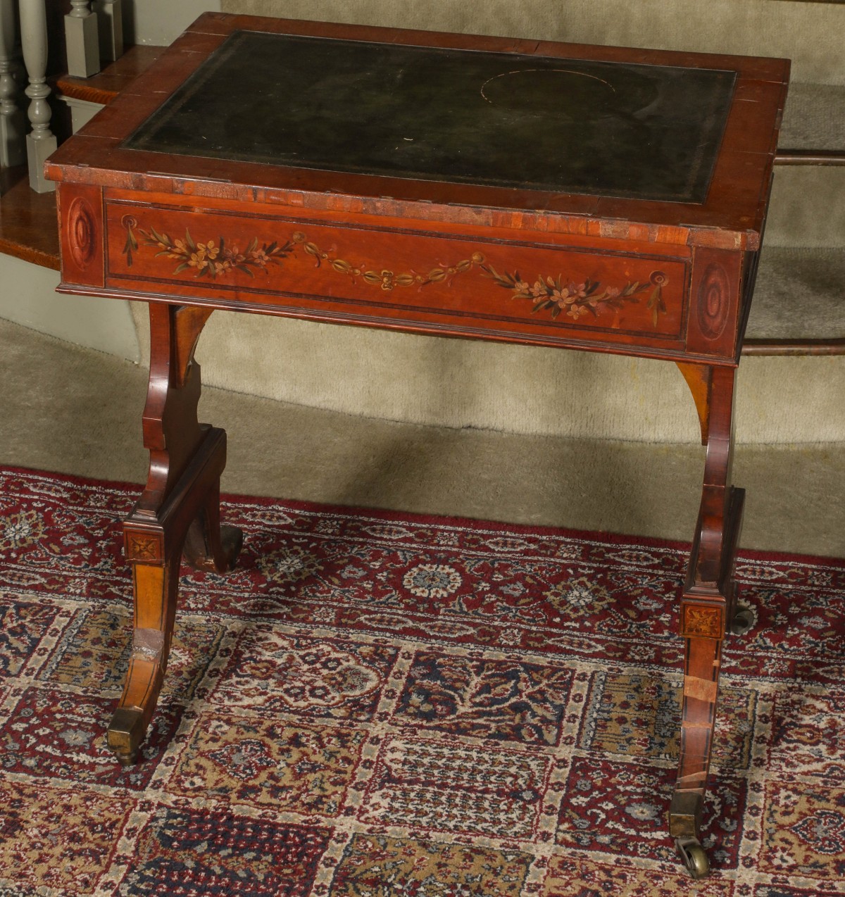 A 19TH CENTURY REGENCY STAND WITH PAINT DECORATION