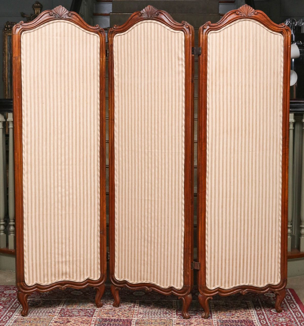 A FRENCH WALNUT LOUIS XV STYLE THREE-FOLD SCREEN