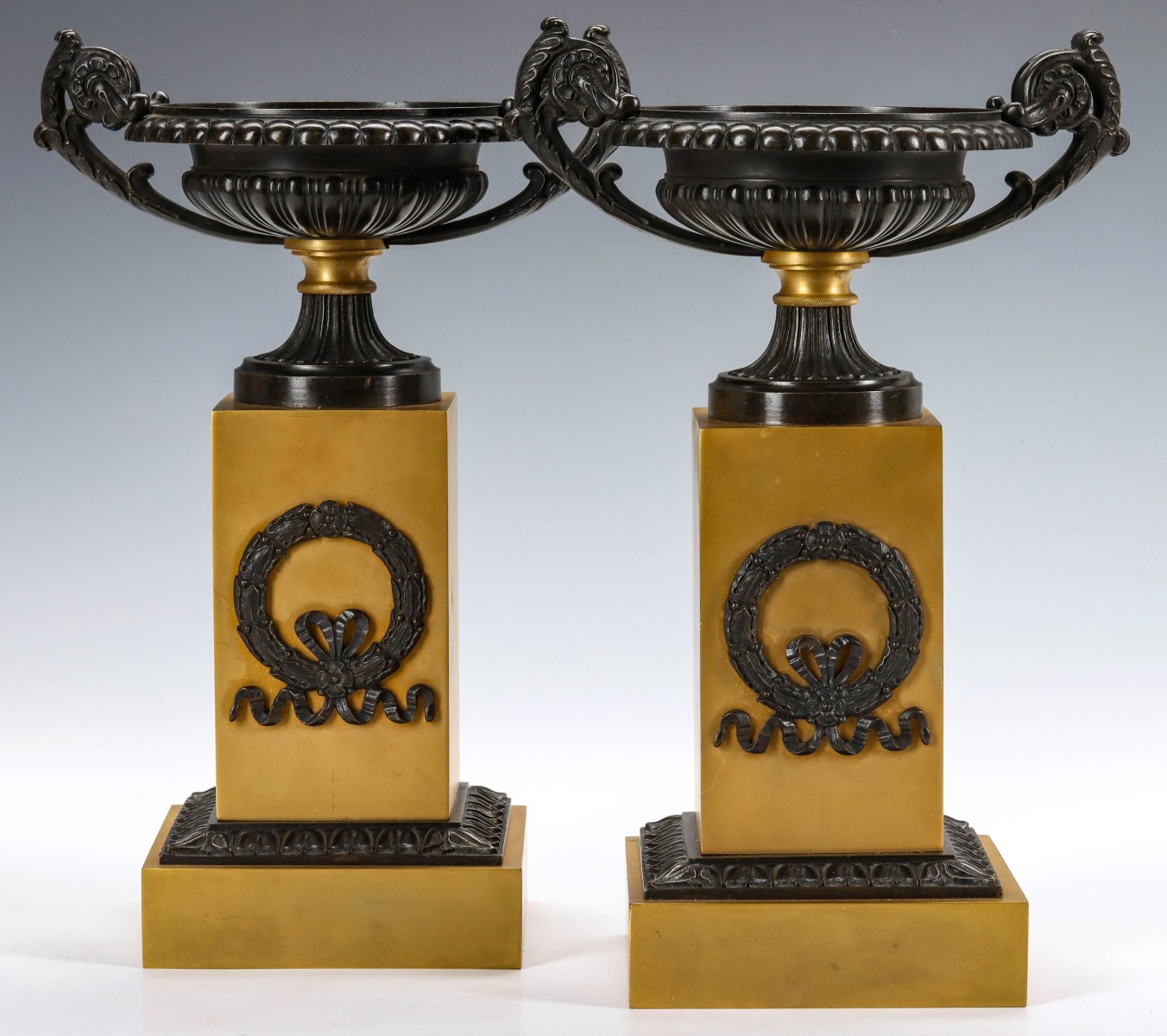 A PAIR EARLY TO MID 20TH C. BRONZE OR BRASS TAZZA PAIR