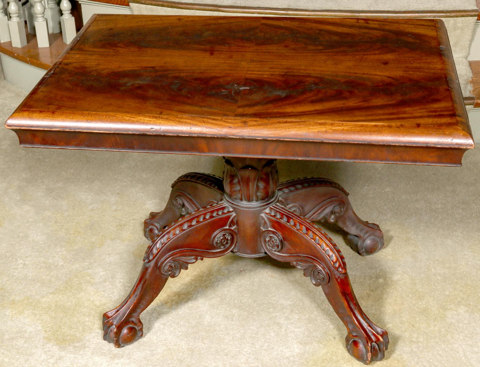 A FINE LOUIS PHILIPPE TABLE WITH FLAME MAHOGANY TOP