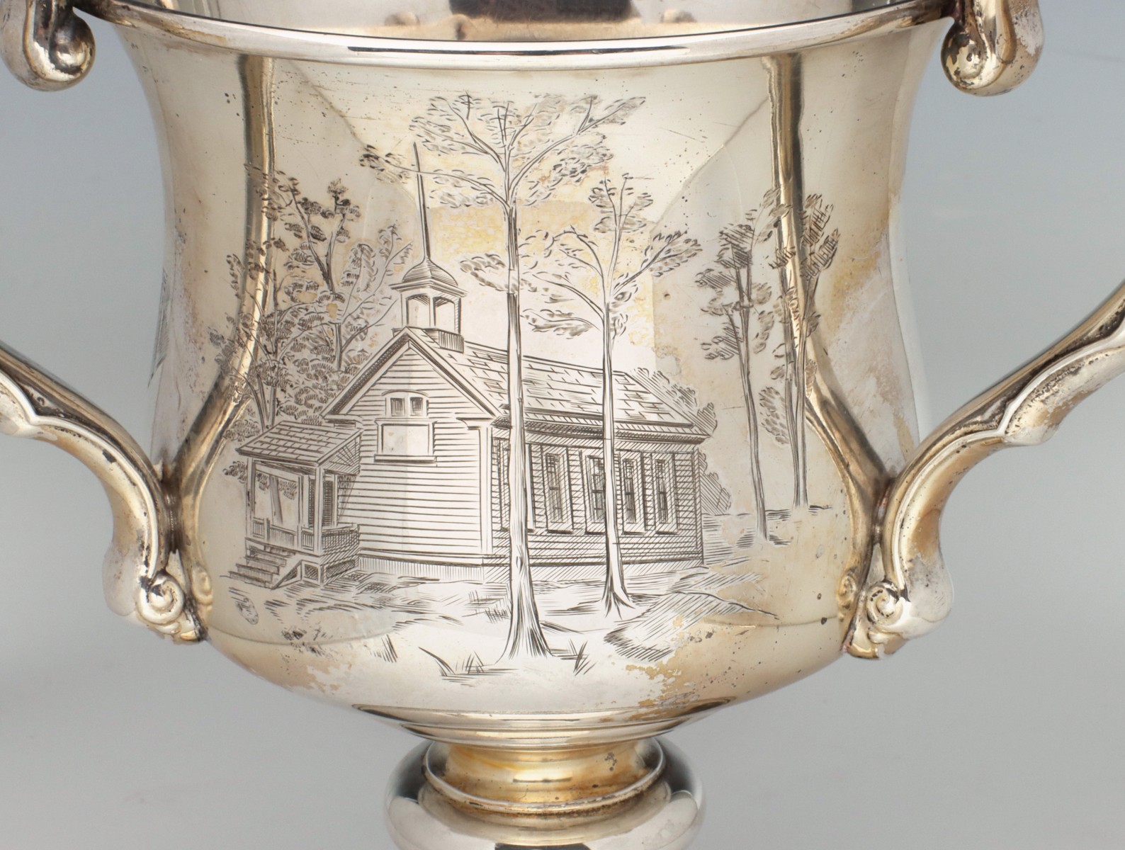 A WOODSIDE STERLING LOVING CUP WITH DETAILED ENGRAVINGS