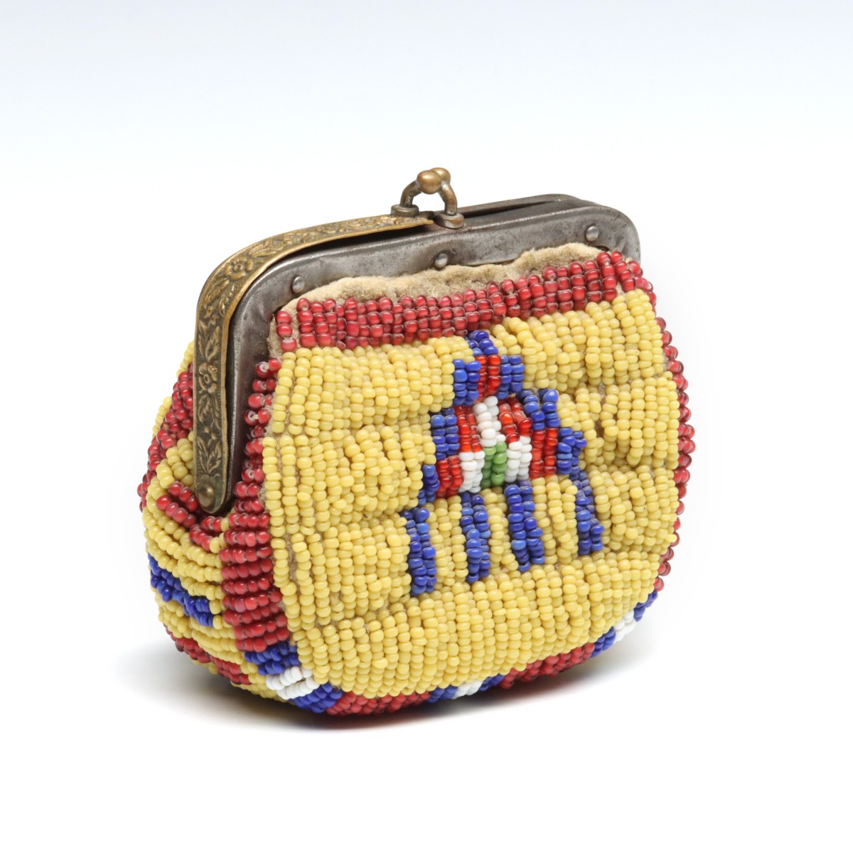 A COIN PURSE EMBELLISHED WITH NATIVE AMERICAN BEADWORK