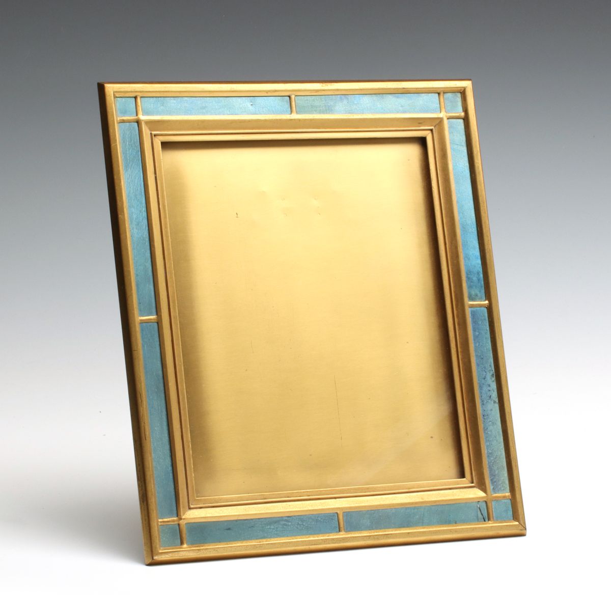A GILT BRONZE AND FAVRILE PICTURE FRAME SIGNED TIFFANY