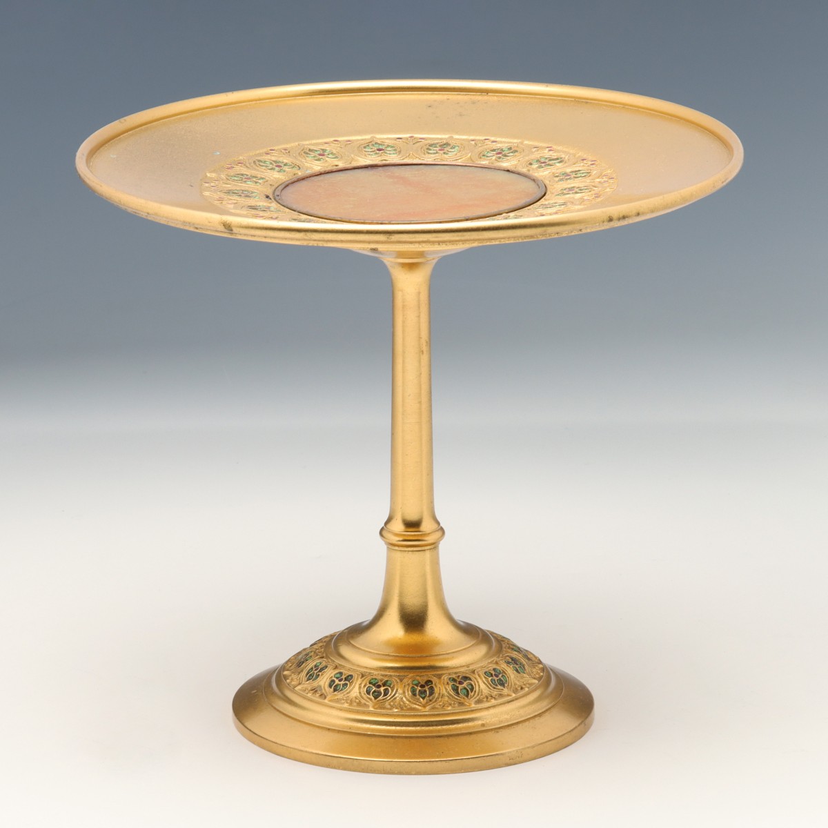 A GILT METAL COMPOTE WITH GLASS ENAMELS SIGNED TIFFANY