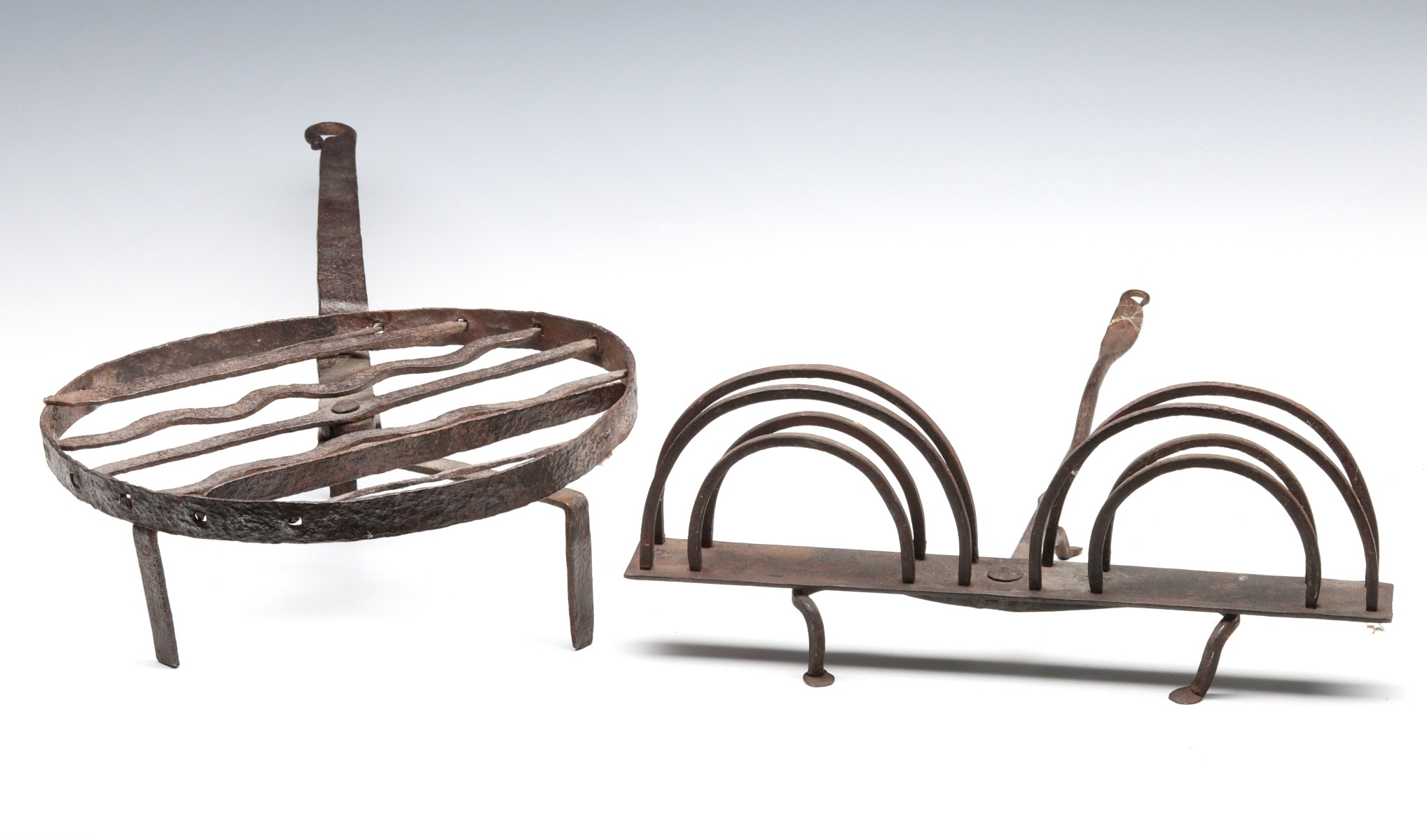 WROUGHT IRON TOASTER AND REVOLVING TRIVET C. 1800