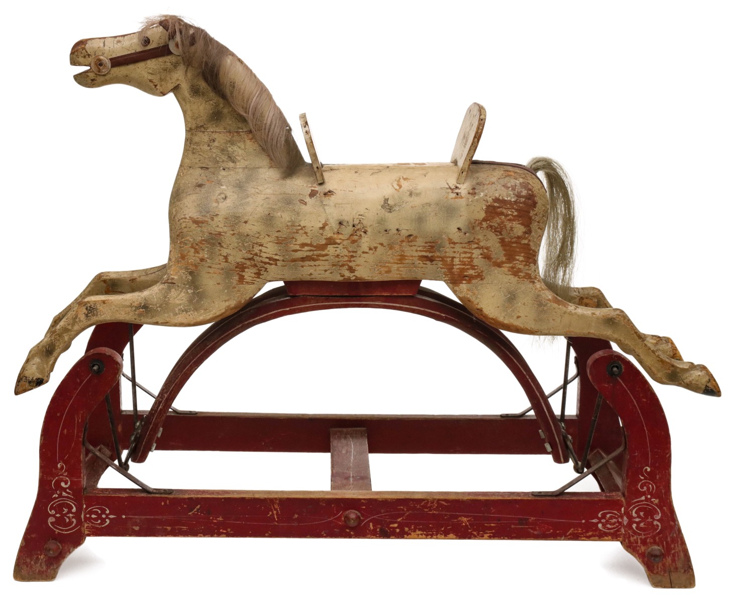 A JOINED, CARVED, PAINTED WOOD SWING HORSE ON STAND