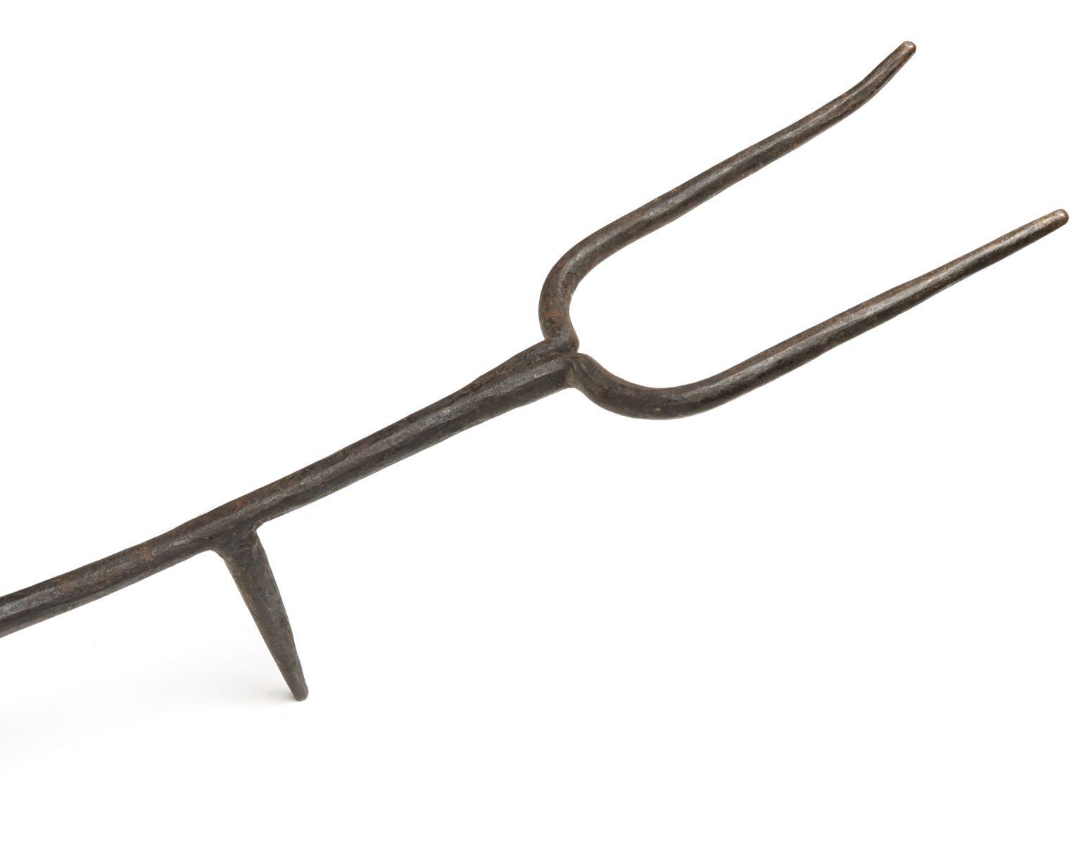 A LARGE FORGED IRON HEARTH FORK WITH HEART HANDLE