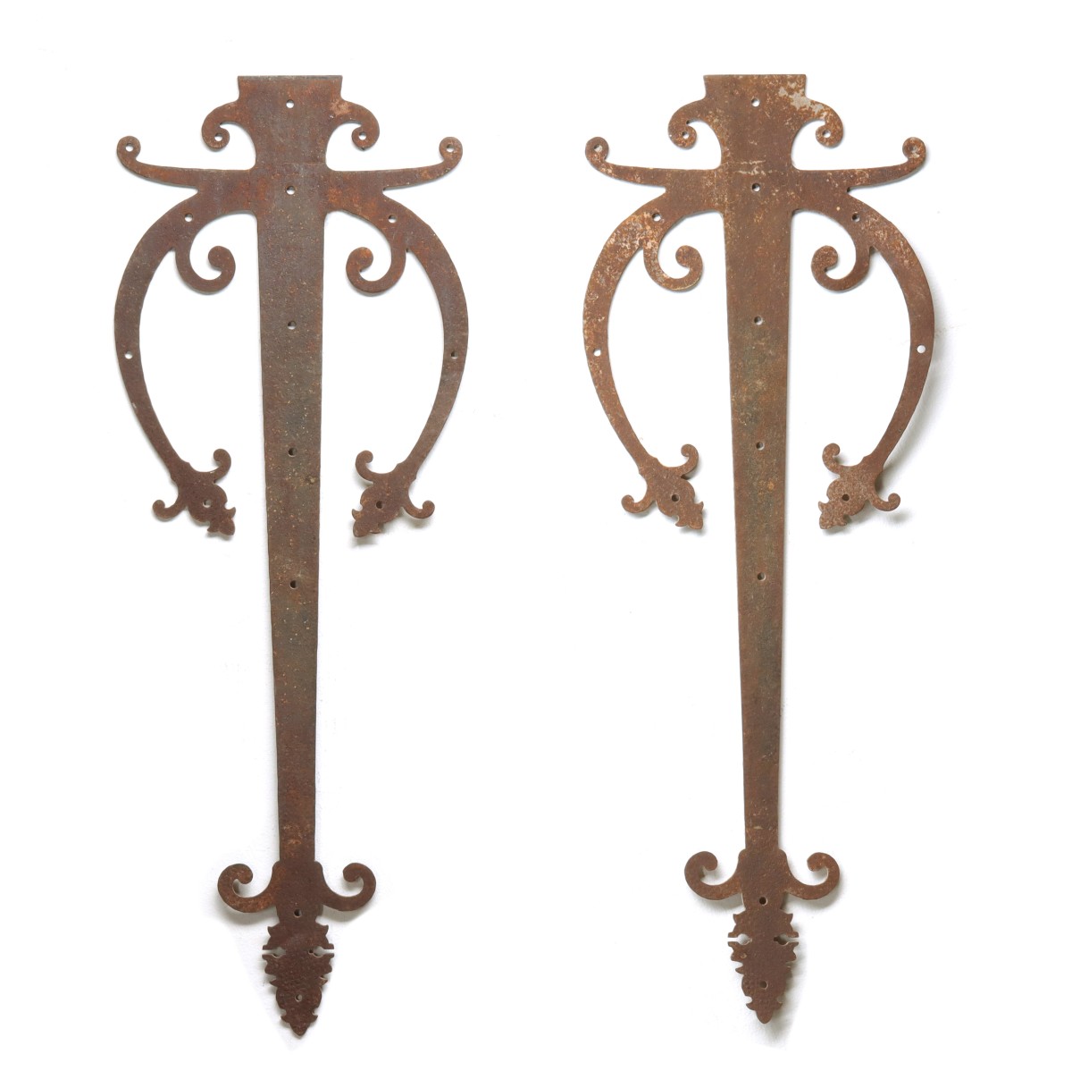 A FINE LARGE PAIR OF ORNATE FORGED IRON HINGES