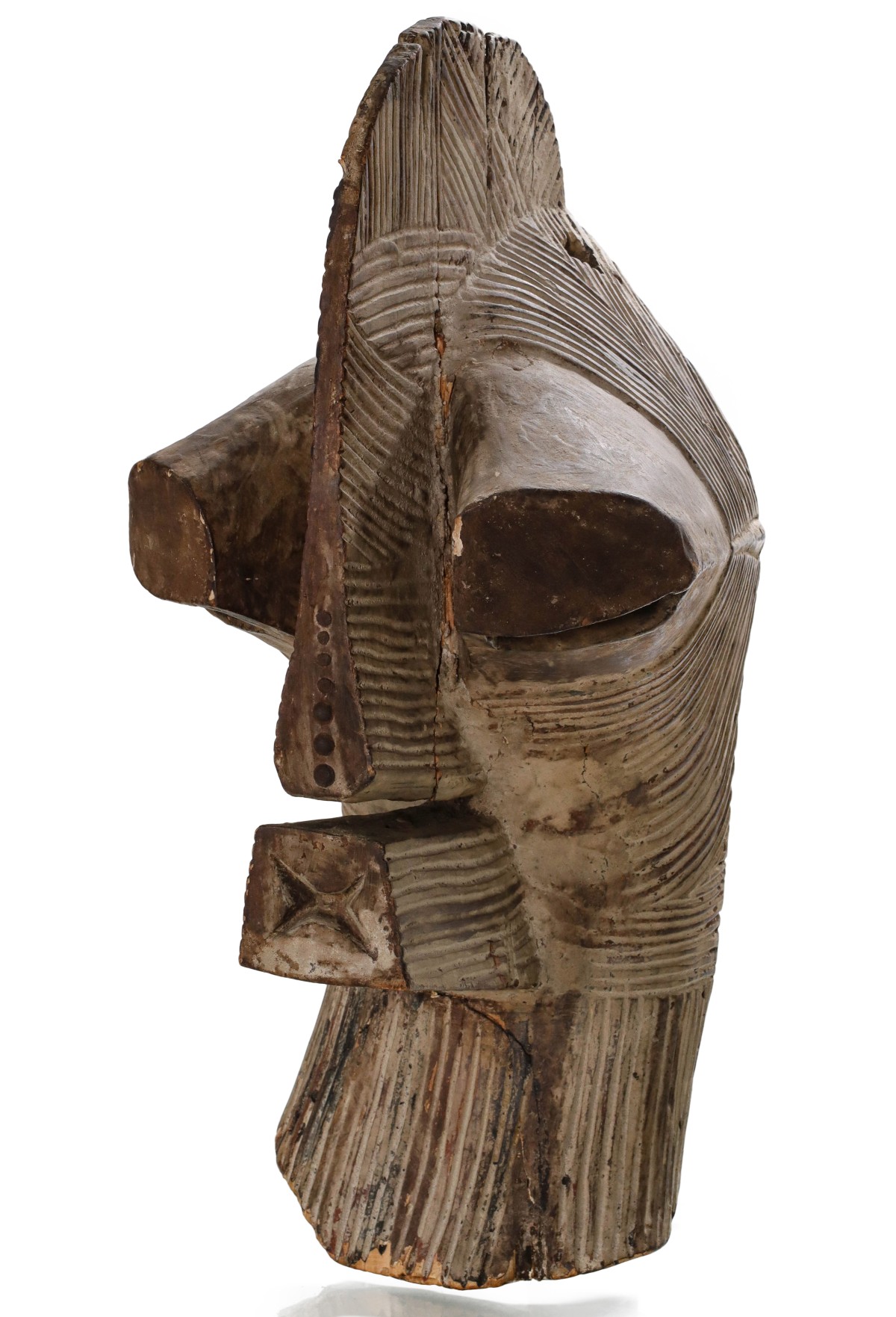 A CARVED STRIATED AFRICAN MASK ATTR SONGYE PEOPLES