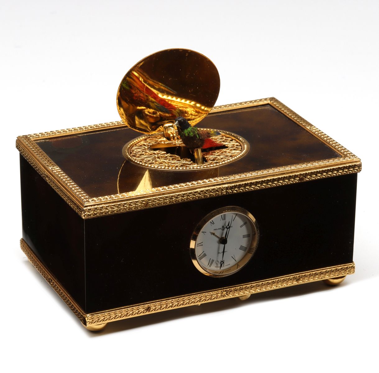 A REUGE ENAMELED MUSIC BOX WITH BIRD AUTOMATON AND CLOCK