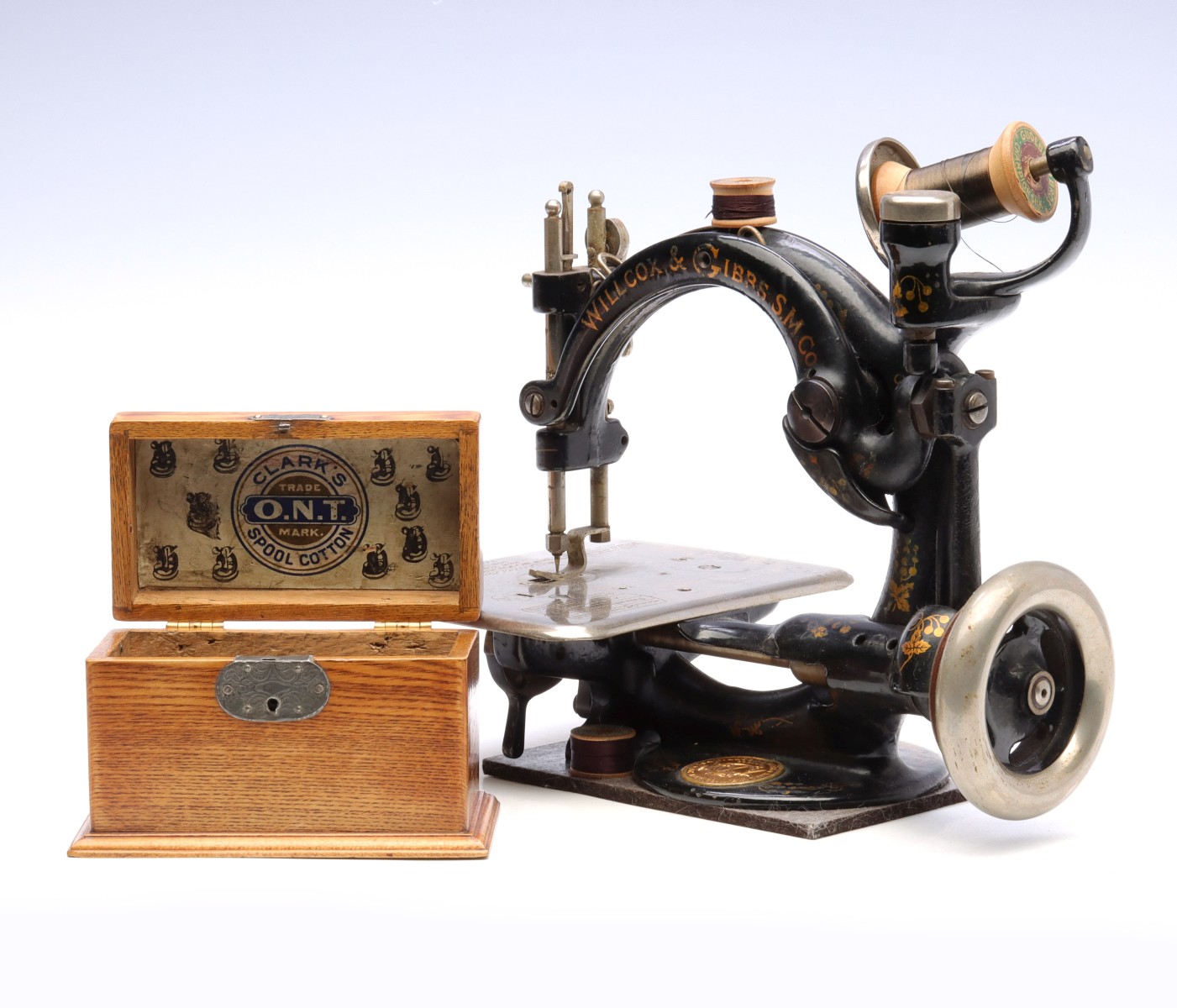 A WILLCOX & GIBBS SEWING MACHINE, CIRCA 1894