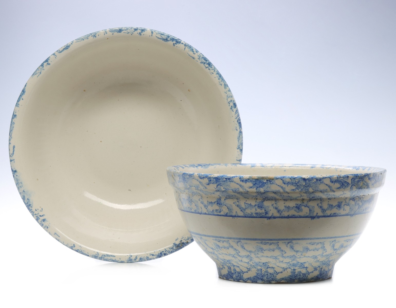 TWO BLUE AND WHITE SPONGEWARE MIXING BOWLS
