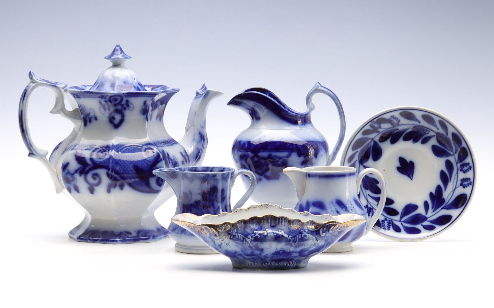 A COLLECTION OF ANTIQUE FLOW BLUE CHINA