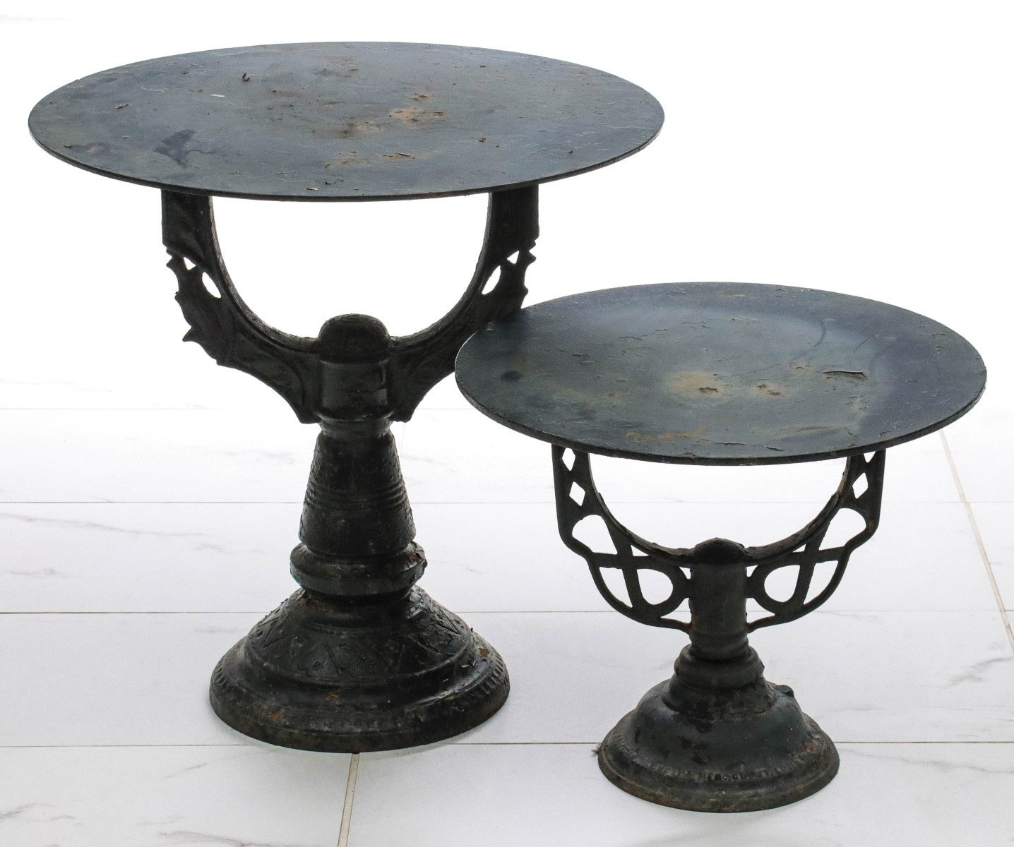 TWO YOKE BASE CAST IRON STANDS WITH CIRCULAR TOP